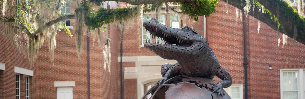 Metal Gator on a Metal globe on UF campus